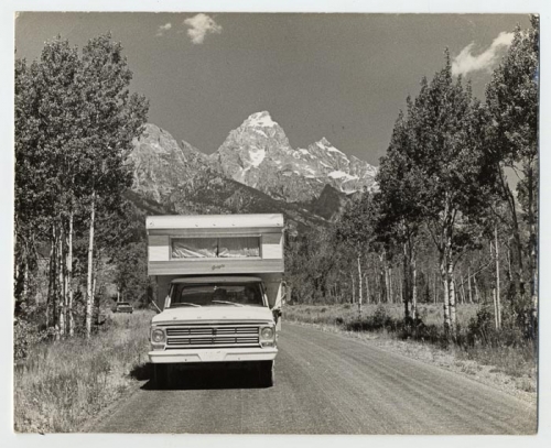 Moose, Wyoming - Jeri Anderson in A Pick-up Camper, Tetons in Background.