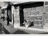 Reading the Morning Paper in Hindi, (Varanasi, India).
