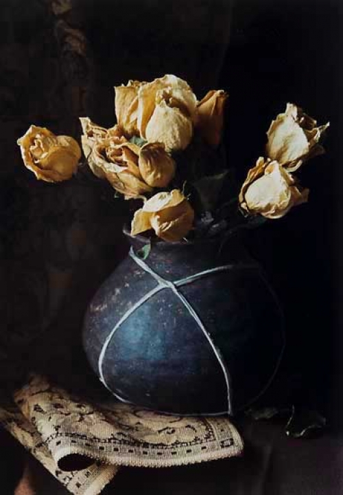 Dried Roses with Black Pot and Tapestry.