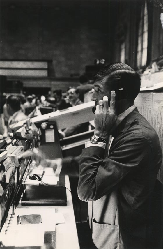 Broker in the Booth of the American Stock Exchange.